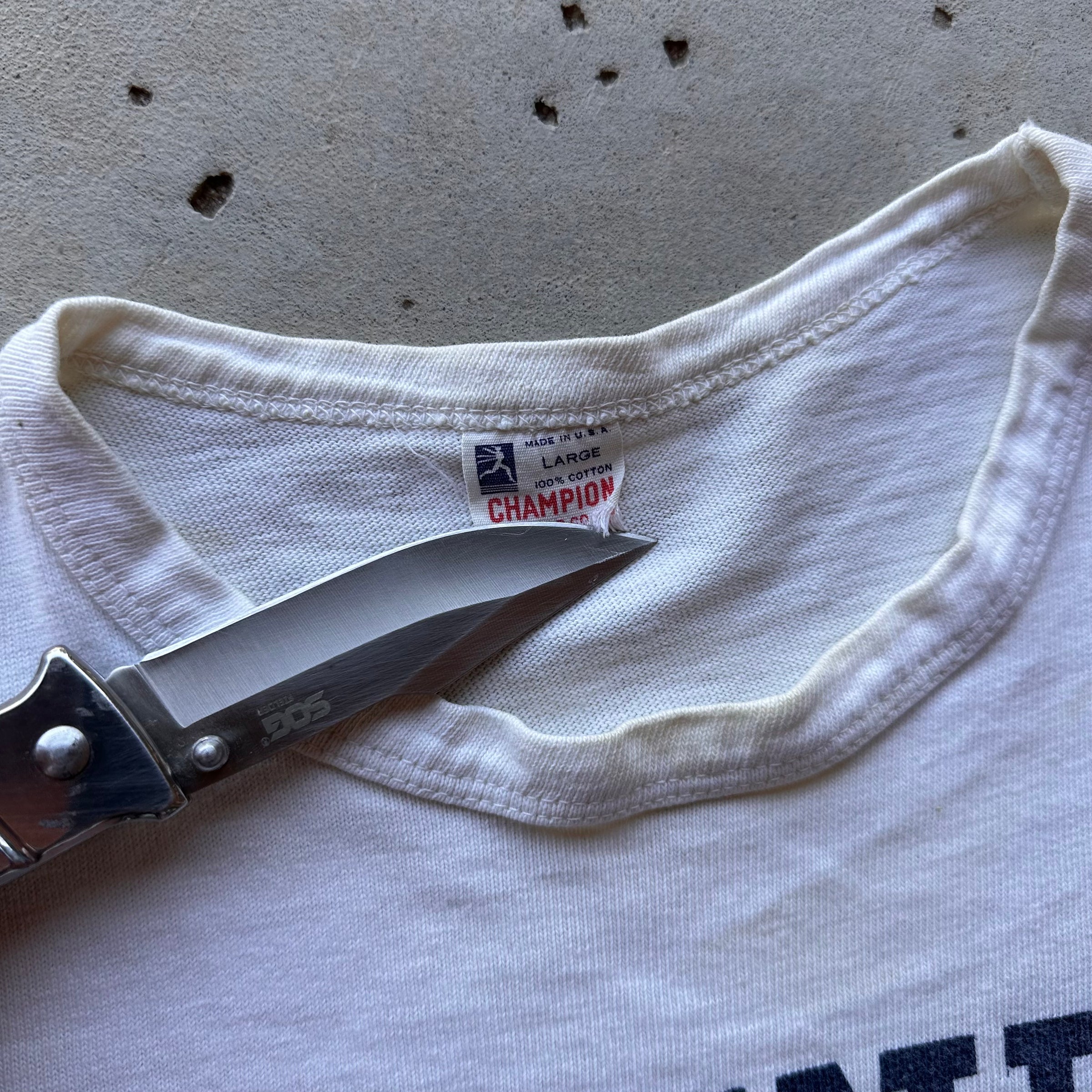 1950’s Champion Running Man Water Print Collegiate T-Shirt Tagged Large